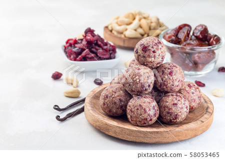 Healthy homemade energy balls with cranberries Healthy homemade energy balls with cranberries 58053465