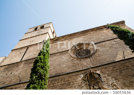 Mallorca cityscape Brick church with round windows Mallorca cityscape Brick church with round windows 58055636