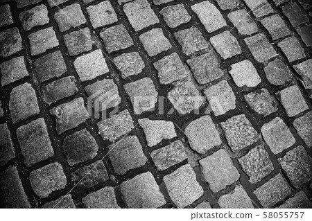 Wet cobbled floor 58055757