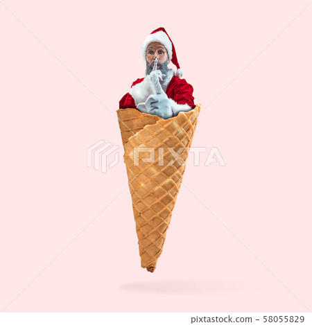 Happy Christmas Santa Claus on coral studio background 58055829