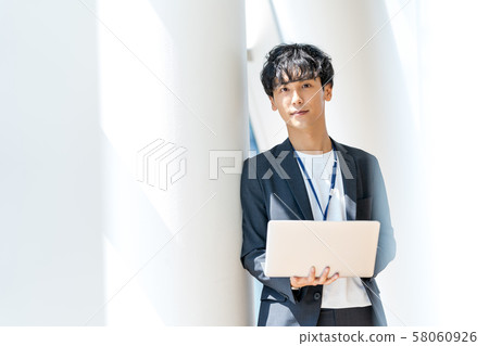 Businessman, office, laptop 58060926