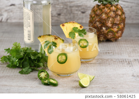 Tequila with pineapple and jalapeno 58061425