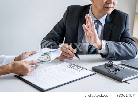 Anti Bribery and corruption concept, bribe in the Anti Bribery and corruption concept, bribe in the 58061497