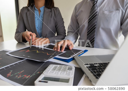 A team of business executives are planning consultations about business investments related to shares. By analyzing and calculating the stock market to find marketing profits A team of business executives are planning consultations about business investments related to shares. By analyzing and calculating the stock market to find marketing profits 58062890