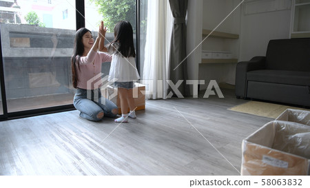 Holiday concept. The daughter is helping the Holiday concept. The daughter is helping the 58063832