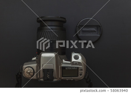 Photographer workplace with dslr camera system on Photographer workplace with dslr camera system on 58063940