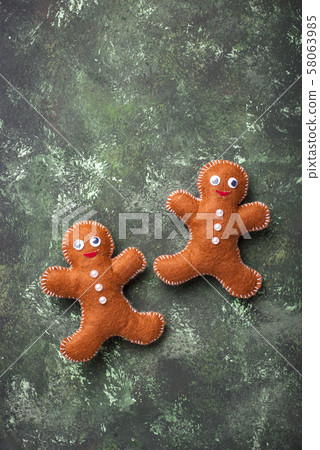 Christmas gingerbread men made of felt Christmas gingerbread men made of felt 58063985