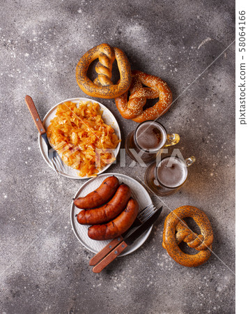 Beer, pretzels, sausages and stewed sauerkraut 58064166