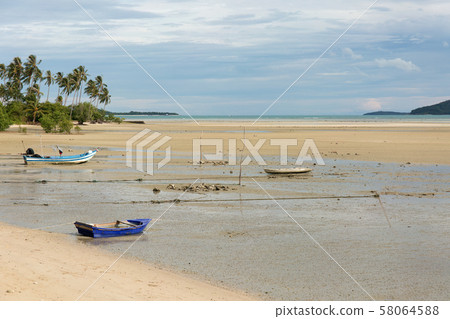 Boats at low tide. Sea cost. Boats at low tide. Sea cost. 58064588