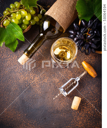 Grape, wine and vintage corkscrew Grape, wine and vintage corkscrew 58064594