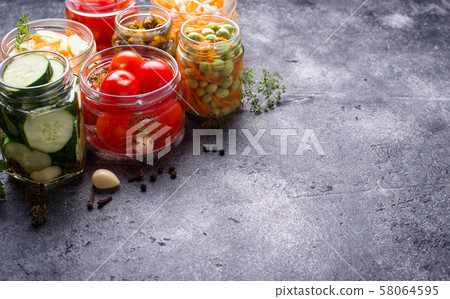 Fermented food. Preserved vegetables in jars Fermented food. Preserved vegetables in jars 58064595
