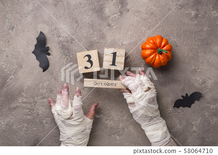 Halloween background with mummy hand Halloween background with mummy hand 58064710
