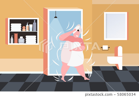fat obese woman in white towels wrapped around head and body after shower unhealthy lifestyle 58065034