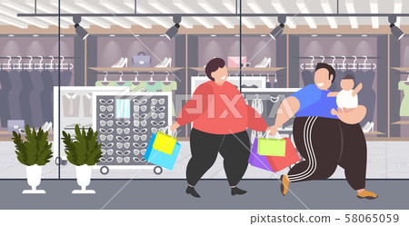 fat obese men with child holding shopping bags overweight guys with little kid walking together big fat obese men with child holding shopping bags overweight guys with little kid walking together big 58065059