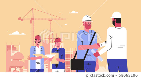 builders team shaking hands during meeting mix race engineers workers in helmet discussing new builders team shaking hands during meeting mix race engineers workers in helmet discussing new 58065190