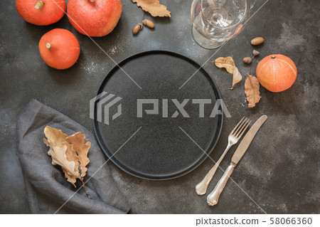 Thanksgiving Day or Halloween place setting. 58066360