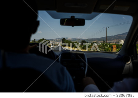 inside view of the car on the road 58067083
