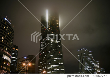 Yokohama cityscape in Japan Yokohama with unstable atmospheric conditions. Clouds that cover the Yokohama Landmark Tower 58067746