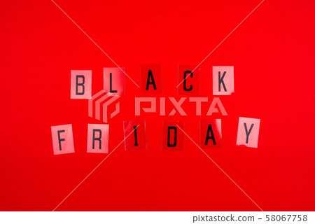 Black Friday sale tag on red background. Black Friday sale tag on red background. 58067758