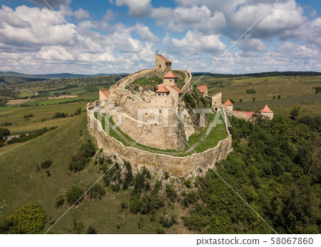 Aerial panoramic view of Rupea Fortress, Transylvania, Romania in sunny day with blue sky. Medieval Aerial panoramic view of Rupea Fortress, Transylvania, Romania in sunny day with blue sky. Medieval 58067860