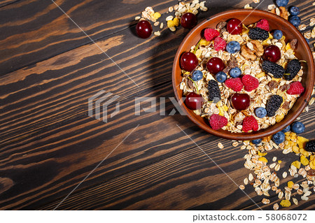 Breakfast with oatmeal and fruit 58068072