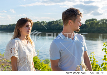 Quarrel of a young couple. Ending relationships. 58070198