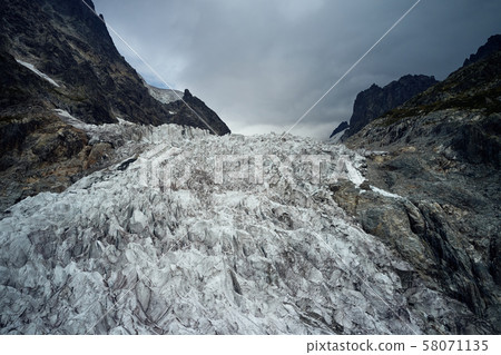Chalaadi Glacier. Shooting from a drone, overcast Chalaadi Glacier. Shooting from a drone, overcast 58071135