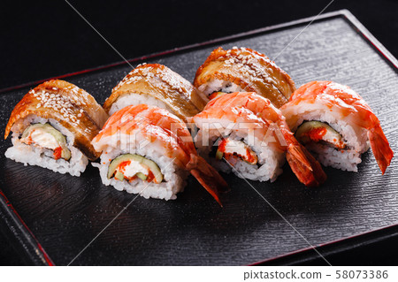 Japanese food, tasty of meal for lunch. Seafood. Sushi with Shrimp and eel black background. 58073386