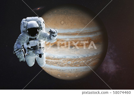 Astronaut close to the Jupiter planet Astronaut close to the Jupiter planet 58074460