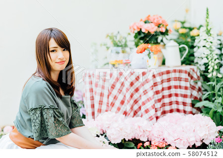 Terrace woman portrait 58074512