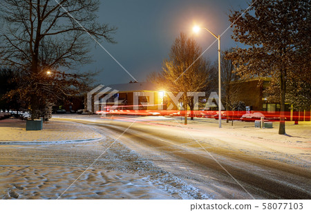 Car light in night on ice road in in the Car light in night on ice road in in the 58077103