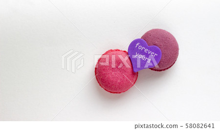 French Pink Macaroons on White Background. French Pink Macaroons on White Background. 58082641