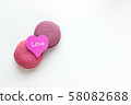 French Pink Macaroons on White Background. 58082688