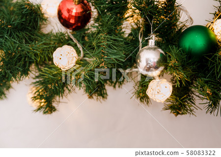 glass ball and decorations on Christmas tree. 58083322