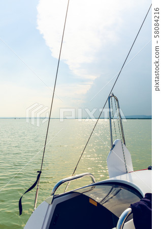 Catamaran boat on Neusiedlersee lake in Austria Catamaran boat on Neusiedlersee lake in Austria 58084216