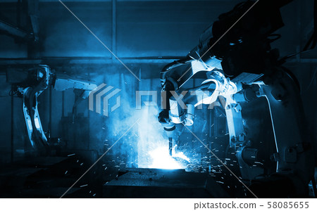 Robot arm in smart factory background Robot arm in smart factory background 58085655