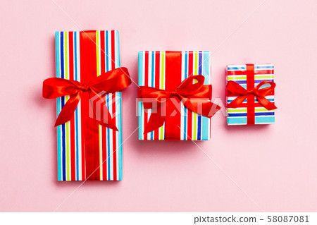Gift box with red bow for Christmas or New Year 58087081