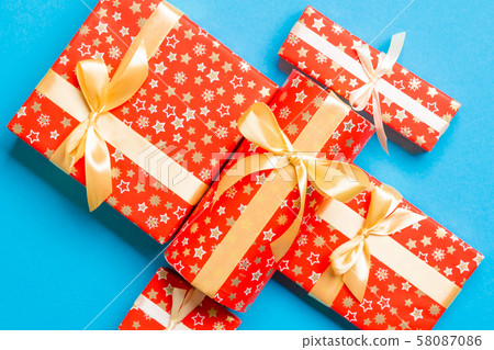 Gift box with gold bow for Christmas or New Year 58087086