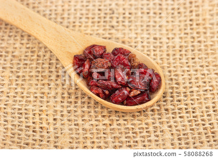 Dry barberry in spoon Dry barberry in spoon 58088268