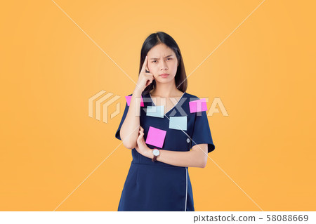Asian business women feeling headache from hard Asian business women feeling headache from hard 58088669