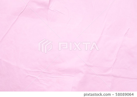 pink colored wet paper wrinkled texture background 58089064