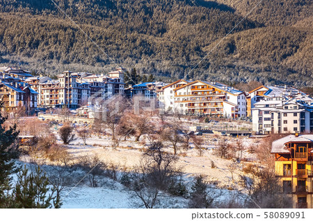 Houses and snow mountains in Bansko, Bulgaria 58089091