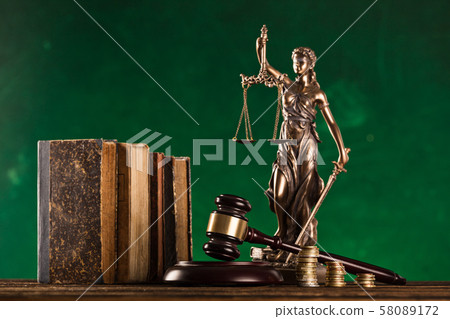 brown gavel with statue of justice. brown gavel with statue of justice. 58089172