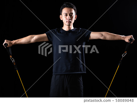 Sportsman doing tube training Sportsman doing tube training 58089848