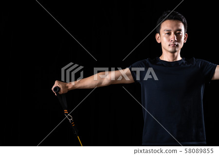 Sportsman doing tube training 58089855