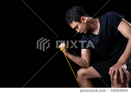 Sportsman doing tube training Sportsman doing tube training 58089864