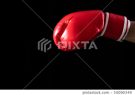 Men wearing boxing gloves Men wearing boxing gloves 58090349