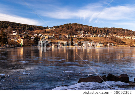 Serraia Lake and Baselga di Pine town - Trentino Italy 58092392