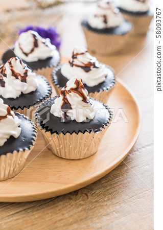 chocolate cup cake with whipped cream chocolate cup cake with whipped cream 58093767