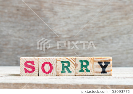 Letter block in word sorry on wood background Letter block in word sorry on wood background 58093775